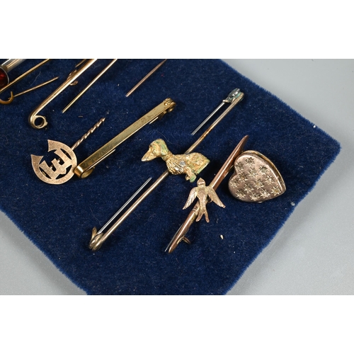 271 - Assorted bar brooches/stick pins including three 9ct, target brooch, some gilt metal (9 and a part 9... 