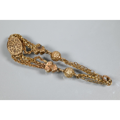 272 - A Victorian 9ct rose gold bracelet formed of three chains linked by balls, and oval foliate engraved... 