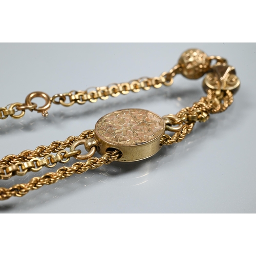 272 - A Victorian 9ct rose gold bracelet formed of three chains linked by balls, and oval foliate engraved... 