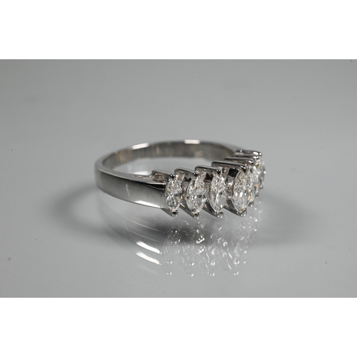 276 - A seven stone diamond ring set 18ct white gold, the graduated marquise shaped diamonds in high claw ... 