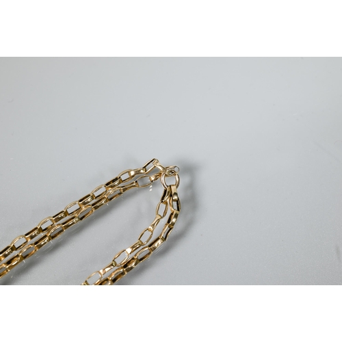 278 - An unmarked yellow metal double guard chain, 52 cm long, 23.5g