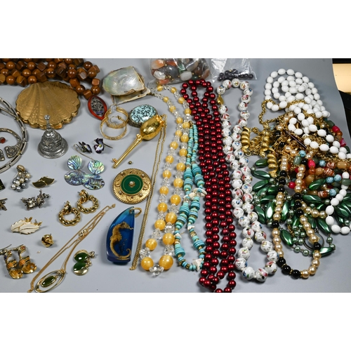 288 - A collection of jewellery including beads, necklaces, earrings, brooches, compact, silver napkin rin... 