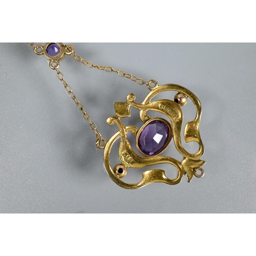 301 - An Art Nouveau pendant, the 9ct yellow gold open scroll design with central oval shaped amethyst, su... 