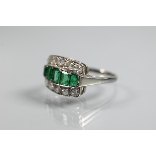 310 - An emerald and diamond three row Art Deco style ring, the central row with five graduated baguette c... 