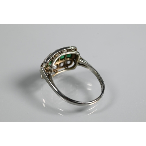 310 - An emerald and diamond three row Art Deco style ring, the central row with five graduated baguette c... 