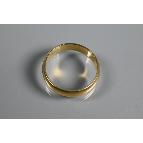 312 - An 18ct yellow gold wedding band, size V, approx 6.3g