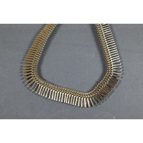 320 - A 9ct yellow gold Cleopatra style fringe necklace of graduated form, 40 cm long (open), approx 23.4g