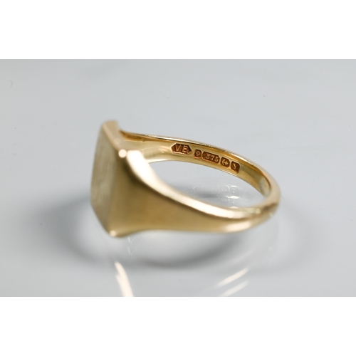 325 - A 9ct yellow gold signet ring, square head with engraved initials, size U, approx 7g