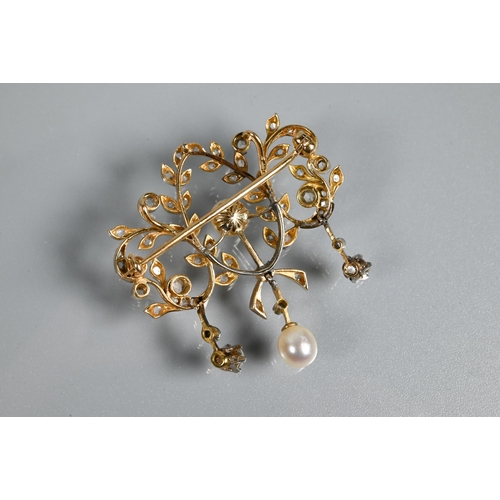 330 - An Edwardian diamond and pearl brooch, the open design formed of leaf tendrils set with mixed cut di... 