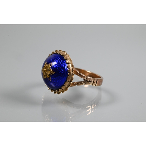 332 - A Victorian ring of blue enamel domed design with inset star motif, 9ct yellow gold set, size P