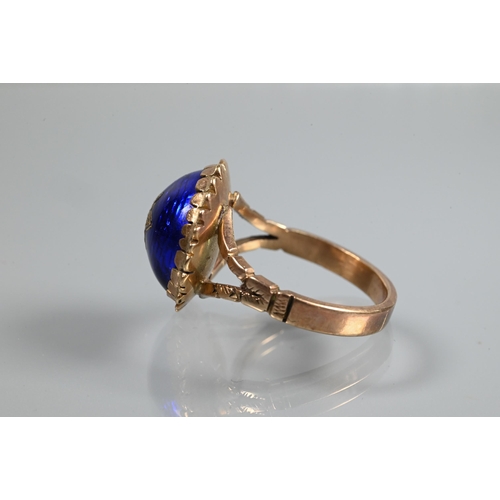 332 - A Victorian ring of blue enamel domed design with inset star motif, 9ct yellow gold set, size P