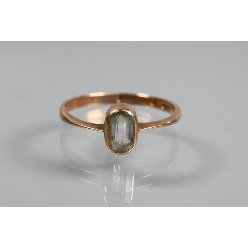 334 - Two 9ct rings, one with split scroll shoulders set with garnet, size N and one set pale blue stone, ... 