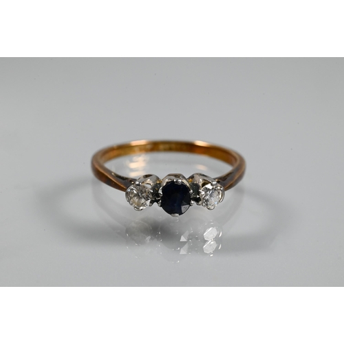 335 - A three stone diamond and sapphire ring, size K and a three stone green paste set ring, 18ct and pla... 