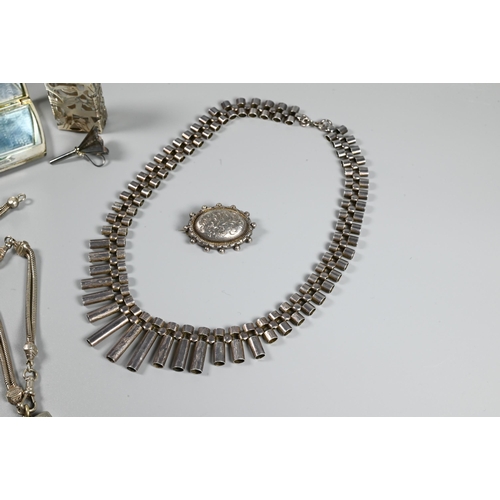 340 - A silver necklace of graduated tubular links, 38 cm long (open); oval brooch with attached pendant a... 