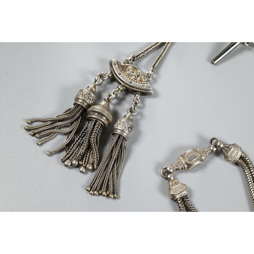 340 - A silver necklace of graduated tubular links, 38 cm long (open); oval brooch with attached pendant a... 