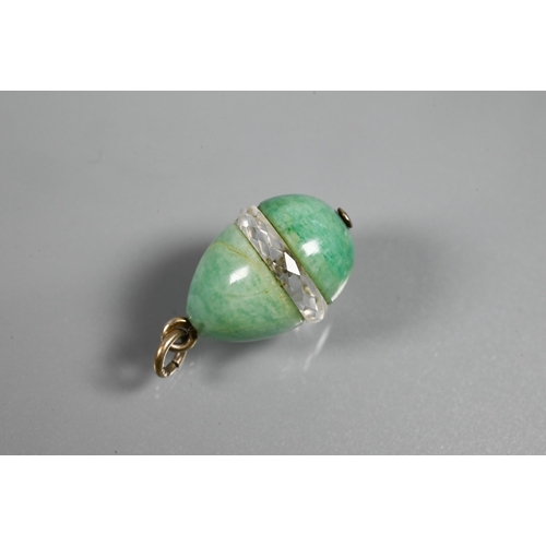 347 - Three various egg-shaped pendants - one pale green hardstone, one green and pale yellow enamel, and ... 