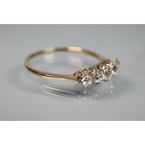 353 - A graduated five stone diamond ring, the old cut diamonds in scroll claw mount, 9ct yellow gold set,... 