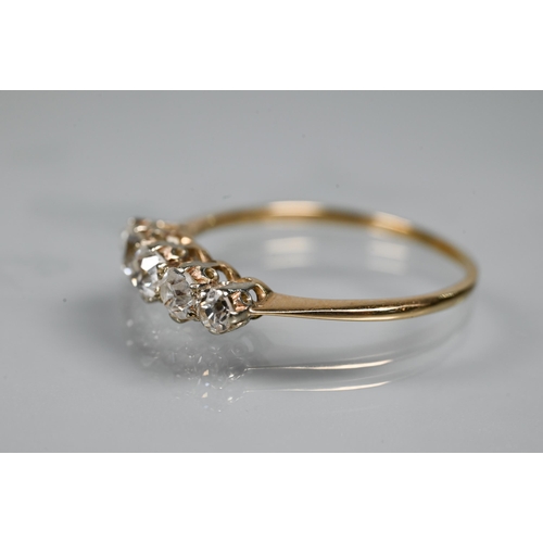 353 - A graduated five stone diamond ring, the old cut diamonds in scroll claw mount, 9ct yellow gold set,... 