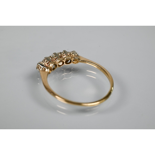 353 - A graduated five stone diamond ring, the old cut diamonds in scroll claw mount, 9ct yellow gold set,... 