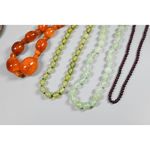 356 - Row of graduated amber beads, two green aventurine bead necklaces, cloisonné bangle, silver oval hal... 