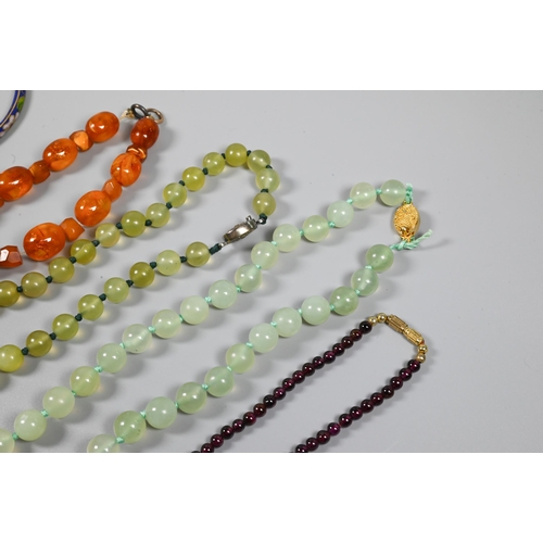 356 - Row of graduated amber beads, two green aventurine bead necklaces, cloisonné bangle, silver oval hal... 