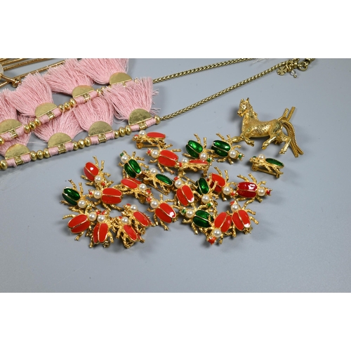 360 - Costume jewellery including gilt metal bangles, watch bangle, bead bracelets, earrings, various desi... 