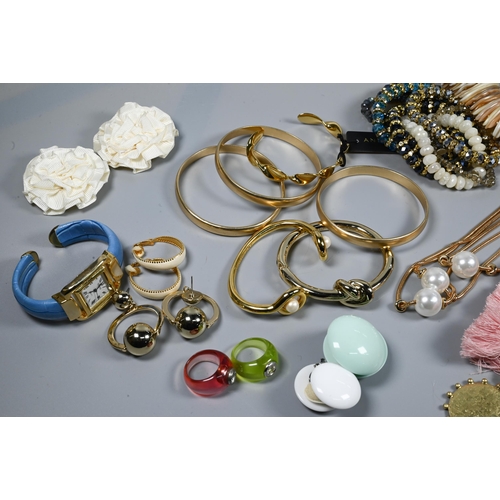 360 - Costume jewellery including gilt metal bangles, watch bangle, bead bracelets, earrings, various desi... 