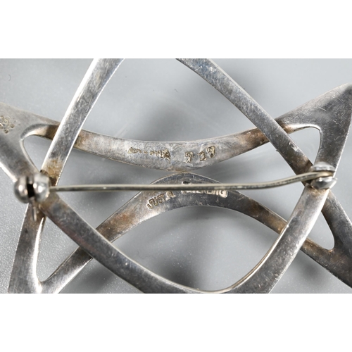 368 - Just Andersen - A Danish silver brooch formed of two conjoined stylised triangles, number 717, stamp... 