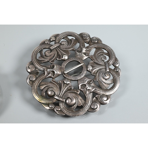 369 - A Norse open dragon design circular brooch, white metal stamped Sterling, 4.5 cm diam to/w another b... 