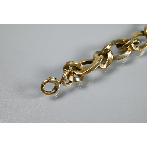 381 - A 9ct yellow gold bracelet formed of elongated open square-edged oval links with curb links between,... 