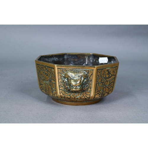 400 - A late 19th century Chinese bronze bowl or censer, late Qing dynasty, octagonal form with a pair of ... 