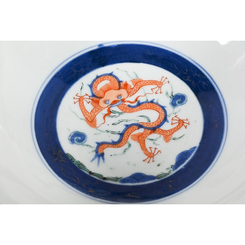 405 - A Japanese polychrome wucai style bowl, Meiji/Taisho period, late 19th or early 20th century, painte... 