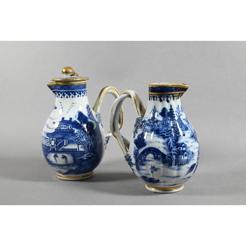 407 - An 18th century Chinese export blue and white sparrow-beak jug and cover with moulded pomegranate fi... 