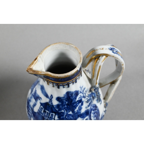 407 - An 18th century Chinese export blue and white sparrow-beak jug and cover with moulded pomegranate fi... 