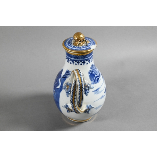 407 - An 18th century Chinese export blue and white sparrow-beak jug and cover with moulded pomegranate fi... 