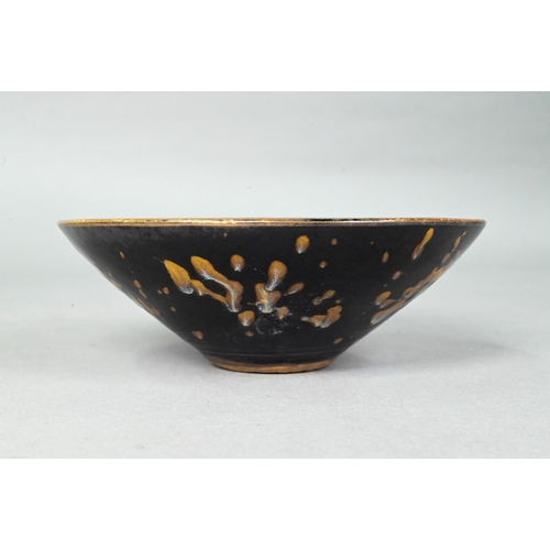 417 - A Chinese Southern Song style Jizhou stoneware bowl, the interior with three paper-cut phoenix desig... 