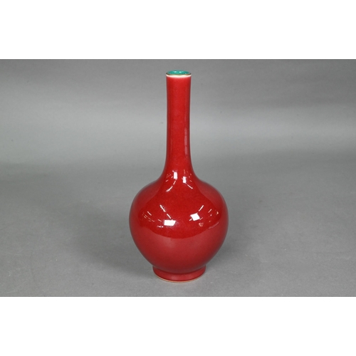 419 - A Chinese copper red langyao monochrome bottle vase in the 18th century manner, the exterior evenly ... 