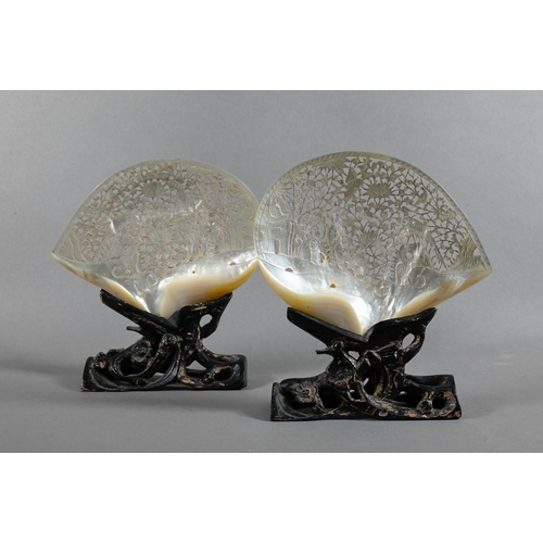 420 - A pair of 19th century Chinese mother-of-pearl ornamental shells, late Qing dynasty, each one intric... 