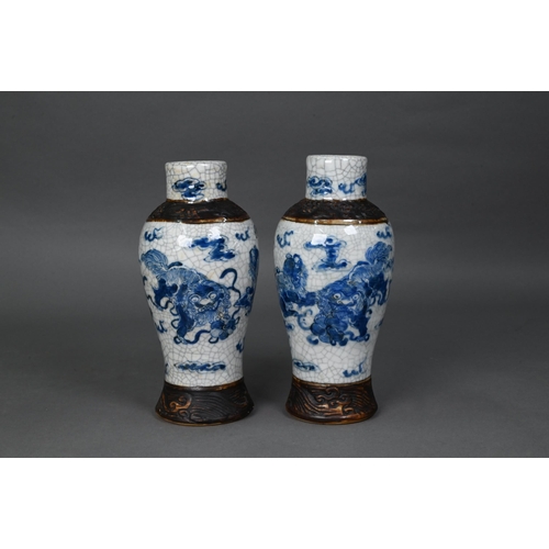 427 - A pair of late 19th century Chinese blue and white Nanjing export baluster vases, Qing dynasty, pain... 