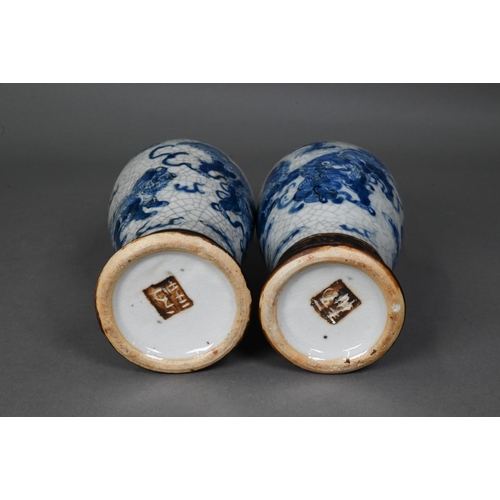 427 - A pair of late 19th century Chinese blue and white Nanjing export baluster vases, Qing dynasty, pain... 