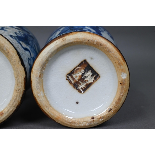 427 - A pair of late 19th century Chinese blue and white Nanjing export baluster vases, Qing dynasty, pain... 