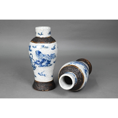 427 - A pair of late 19th century Chinese blue and white Nanjing export baluster vases, Qing dynasty, pain... 