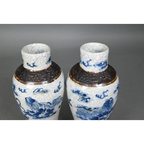 427 - A pair of late 19th century Chinese blue and white Nanjing export baluster vases, Qing dynasty, pain... 