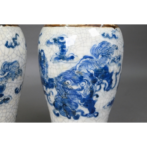 427 - A pair of late 19th century Chinese blue and white Nanjing export baluster vases, Qing dynasty, pain... 