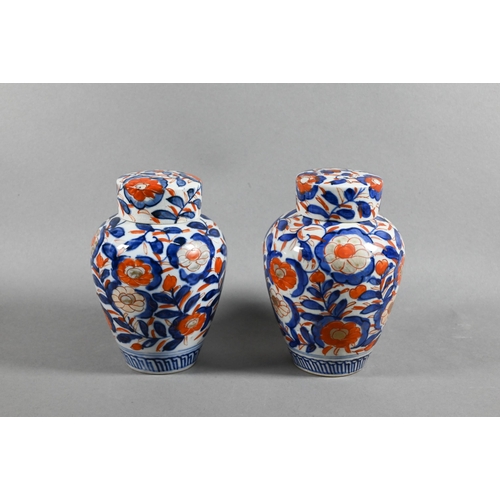 429 - A pair of 19th century Japanese Imari ovoid caddy's with insert covers and domed outer covers, paint... 