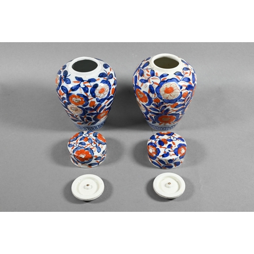 429 - A pair of 19th century Japanese Imari ovoid caddy's with insert covers and domed outer covers, paint... 