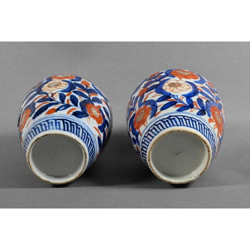 429 - A pair of 19th century Japanese Imari ovoid caddy's with insert covers and domed outer covers, paint... 