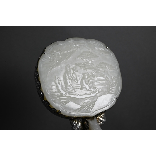 430 - A 19th century Chinese white jade and white metal mounted hand mirror, Qing dynasty, with cloud shap... 