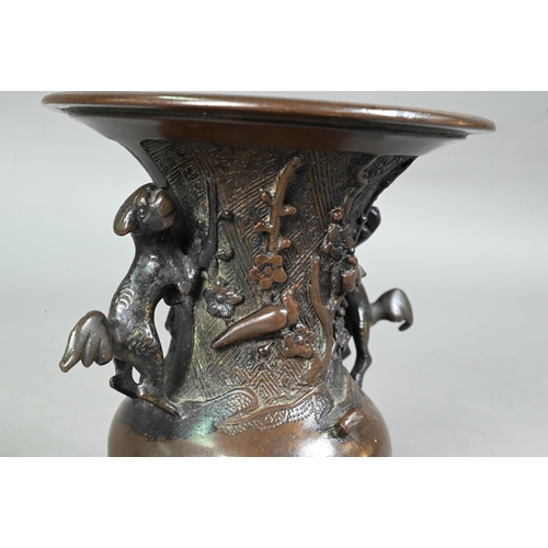 434 - Four late 19th or early 20th century Japanese bronzes comprising a small baluster vase with flared n... 