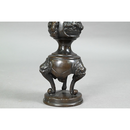 434 - Four late 19th or early 20th century Japanese bronzes comprising a small baluster vase with flared n... 